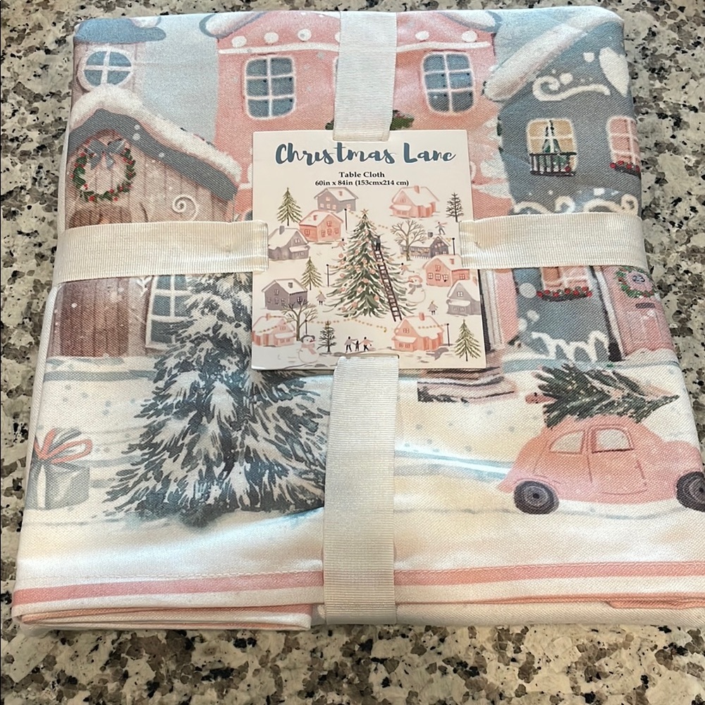 Christmas Lane Holiday Tablecloth 60x84”, NWT, unique holiday scene, polyester.